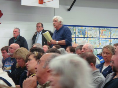 Dave Worth, the host of the &ldquo;Upside Down&rdquo; Show, is addressing the audience with a question.