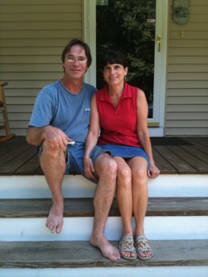 Bob-and-Andrea-Brunelle-sitting-on-the-steps-of-their-former-home-in-Wales